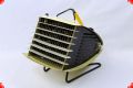 Yellow vintage space heater by Junker Ruh