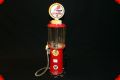 Vintage 50's gumball machine in the shape of a gas pump