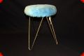 Vintage metal stool with blue fur seating surface